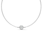 Load image into Gallery viewer, Close-up front view of a round bezel natural diamond bracelet in white gold.