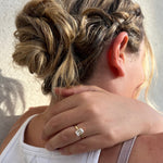 Load image into Gallery viewer, Yellow gold emerald cut solitaire lab-grown diamond ring on woman’s hand
