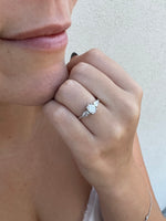 Load image into Gallery viewer, oval cut three stone diamond ring with pear side stones on hand natural diamonds