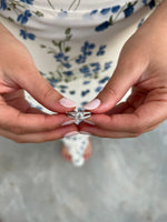 Load image into Gallery viewer, Round cut split shank diamond engagement ring held in hands natural diamonds