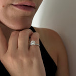 Load image into Gallery viewer, a close up of a person wearing a diamond ring