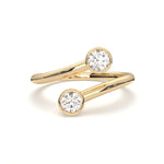 Load image into Gallery viewer, a pair of gold rings with a diamond