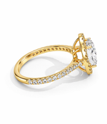 Load image into Gallery viewer, Oval halo lab-grown diamond ring in yellow gold, angled side view on a white background.