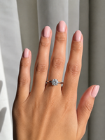 Load image into Gallery viewer, On-hand view of yellow gold solitaire engagement ring with lab-grown round brilliant diamond