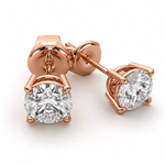 Load image into Gallery viewer, Natural round diamond stud earrings in 14K rose gold with a classic four-prong solitaire setting.