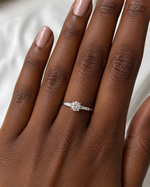 Load image into Gallery viewer, Round Natural Diamond Three-Stone Ring with Tapered Side Diamonds on Hand, White Gold