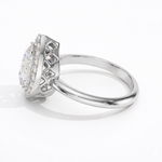 Load image into Gallery viewer, Side view of Pear Halo Biza lab-grown diamond ring highlighting the biza halo setting and polished white gold band