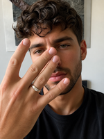 Load image into Gallery viewer, Man wearing Statement Lab-Grown Solitaire Diamond Ring in white gold, featuring a round lab-grown diamond in a polished modern band