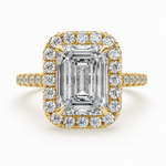 Load image into Gallery viewer, Front view of a lab-grown emerald-cut diamond halo ring in yellow gold with pavé side diamonds