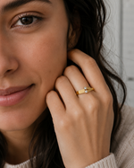 Load image into Gallery viewer, Woman wearing the Different Love lab-grown diamond ring in yellow gold.