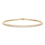 Load image into Gallery viewer, Classic round tennis bracelet with natural diamonds in yellow gold, studio view