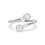 Load image into Gallery viewer, a pair of white gold rings with a diamond