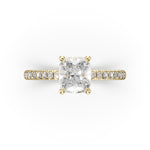 Load image into Gallery viewer, a yellow gold ring with a princess cut diamond