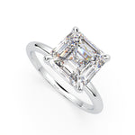 Load image into Gallery viewer, a diamond engagement ring with a princess cut diamond
