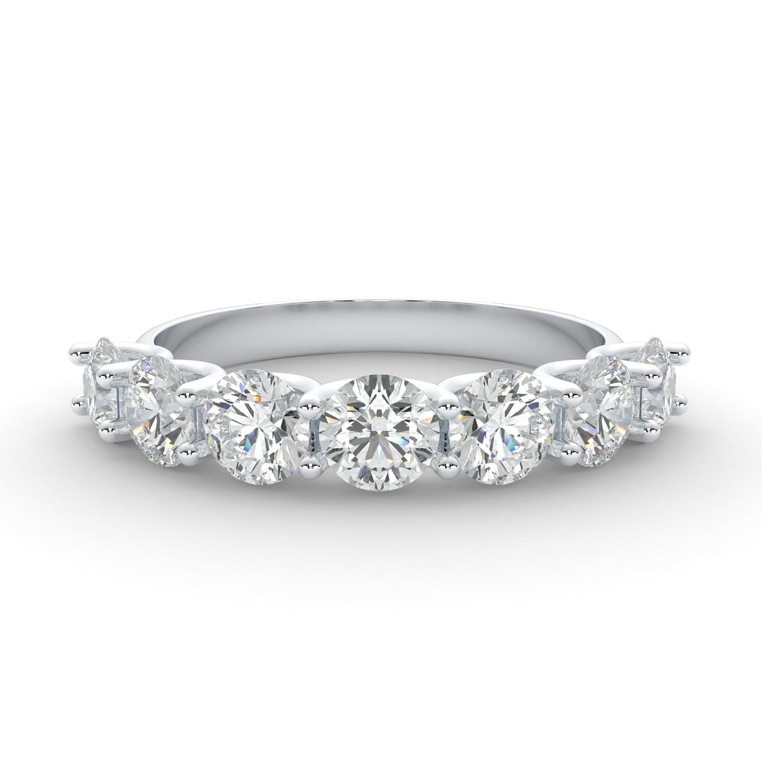 a five stone diamond ring on a white background