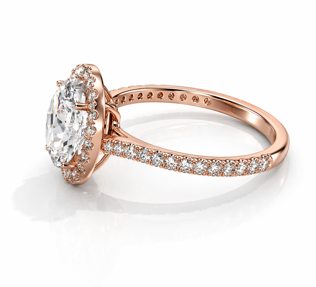        Oval halo lab-grown diamond ring in rose gold, angled side view on a white background.
