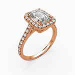 Load image into Gallery viewer, Close-up side view of emerald cut natural diamond halo ring in rose gold, highlighting the halo setting and band details