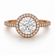 Rose gold round halo diamond ring with side stones, front view showcasing the center diamond and halo setting