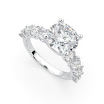 Load image into Gallery viewer, a diamond engagement ring with three stones on the side
