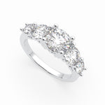 Load image into Gallery viewer, a three stone engagement ring with three diamonds
