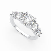 a three stone engagement ring with three diamonds