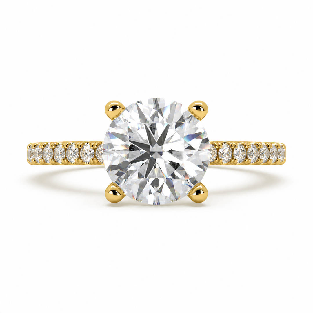 Round lab-grown diamond solitaire ring with side stones in yellow gold front view