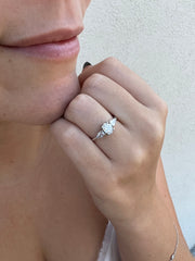 a close up of a person with a ring on their finger