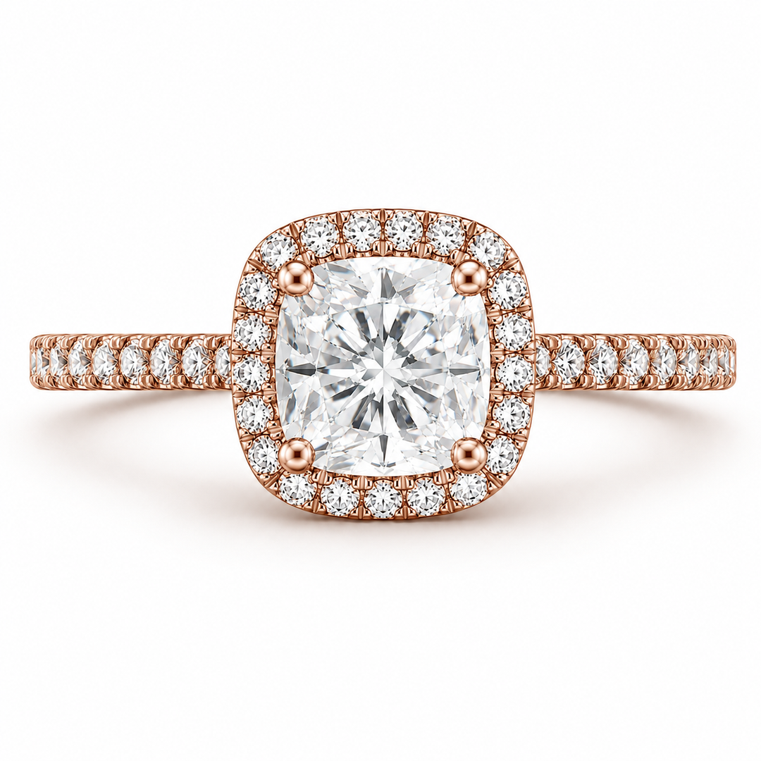     Cushion halo natural diamond ring in rose gold, front view on a white background.