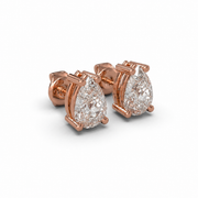 Side view of natural pear cut diamond stud earrings in rose gold