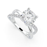 a diamond engagement ring with a twisted band