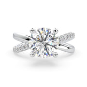 a diamond engagement ring with a twist band
