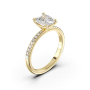 a yellow gold engagement ring with a princess cut diamond