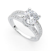 a white gold engagement ring with a center diamond