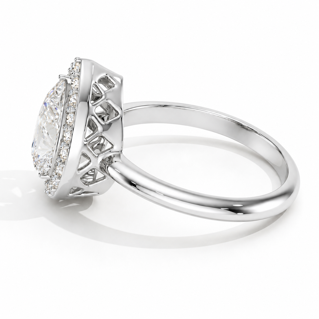Side view of Pear Halo Biza lab-grown diamond ring highlighting the biza halo setting and polished white gold band
