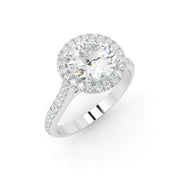 a diamond engagement ring with a halo setting