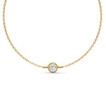 Load image into Gallery viewer,     Round bezel natural diamond bracelet in yellow gold on a white background.
