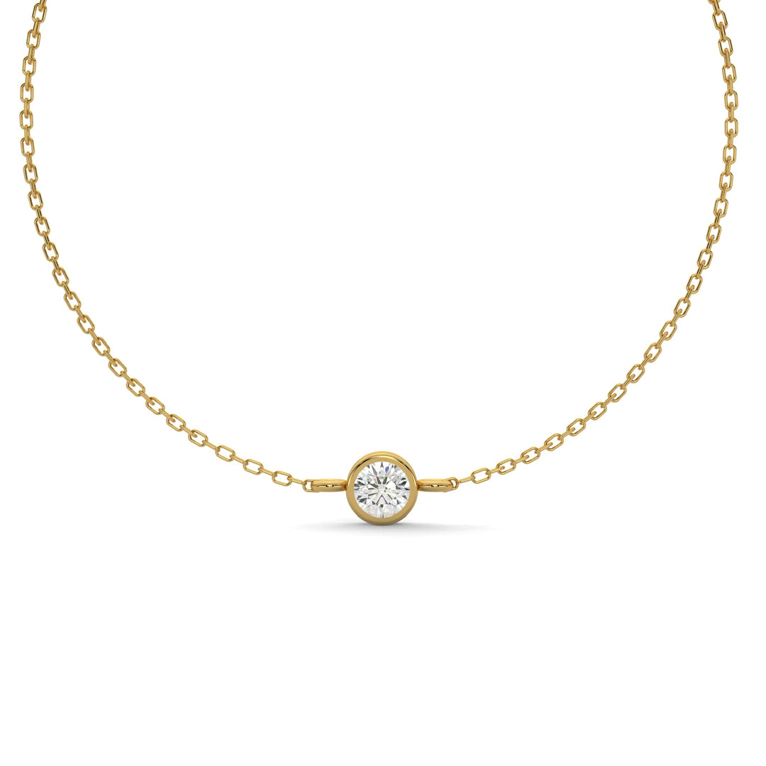     Round bezel natural diamond bracelet in yellow gold on a white background.
