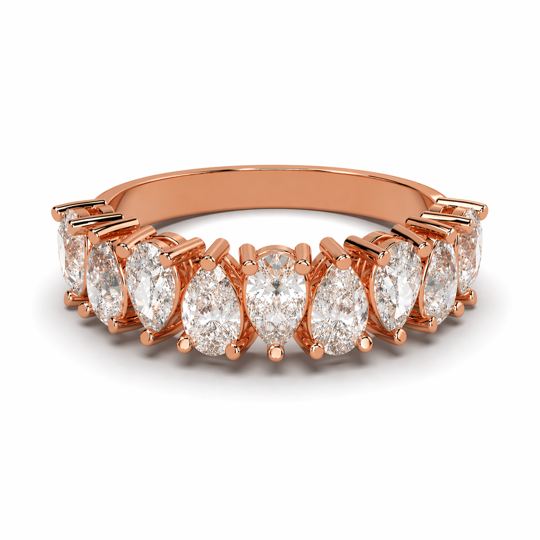 Rose gold half eternity ring featuring nine pear-cut lab-grown diamonds in a clean, balanced layout