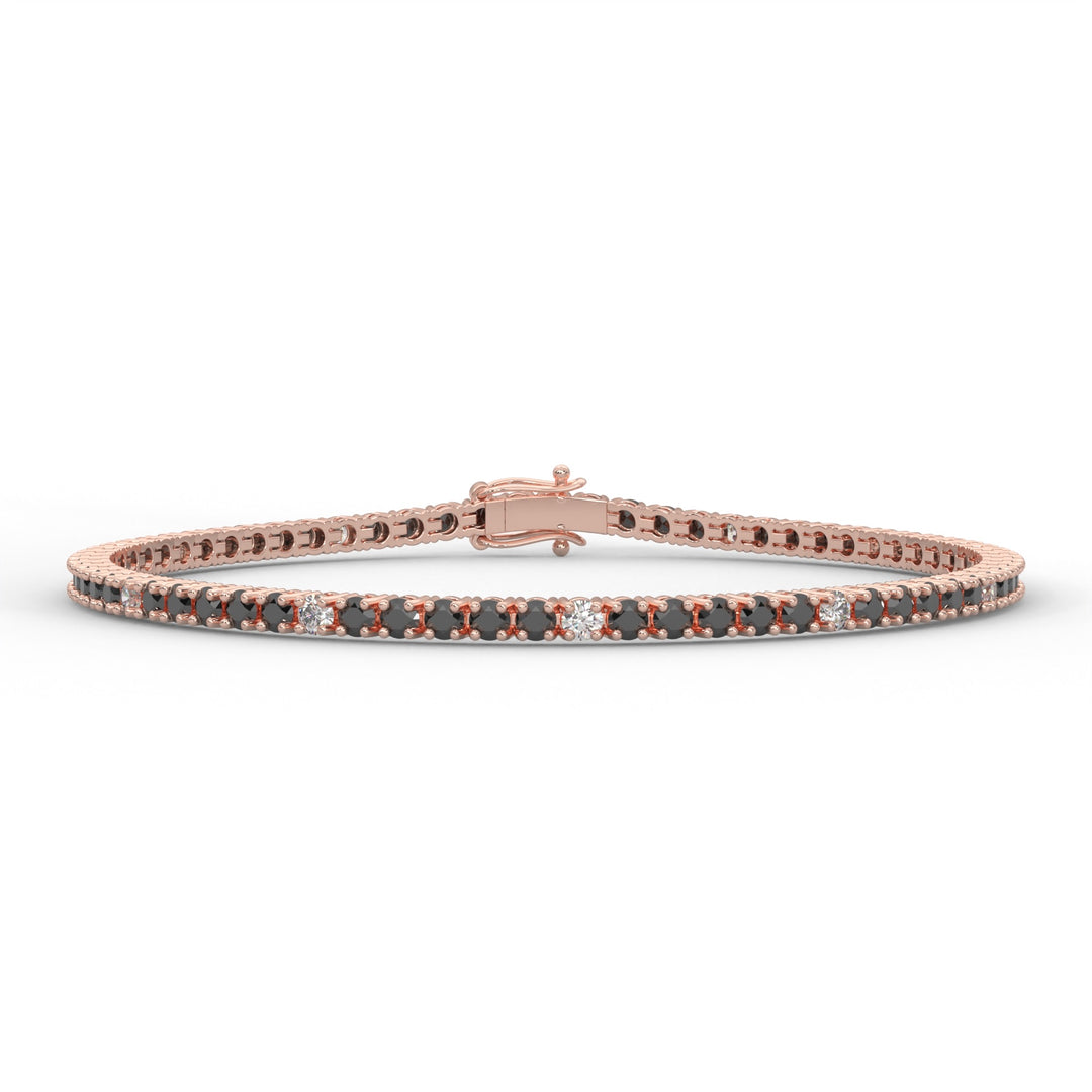 a bracelet with black and white diamonds
