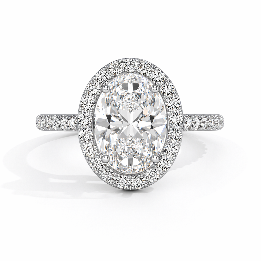 Lab-grown oval halo diamond engagement ring in white gold, front view