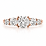 Load image into Gallery viewer, Rose gold five-stone ring with graduated round brilliant natural diamonds, photographed from the front on a clean white background.