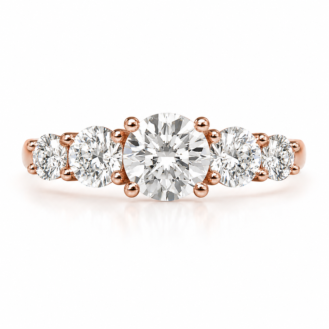 Rose gold five-stone ring with graduated round brilliant natural diamonds, photographed from the front on a clean white background.