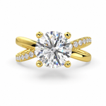 Load image into Gallery viewer,     Round lab grown diamond X-shank engagement ring in yellow gold with pavé diamond band on white background