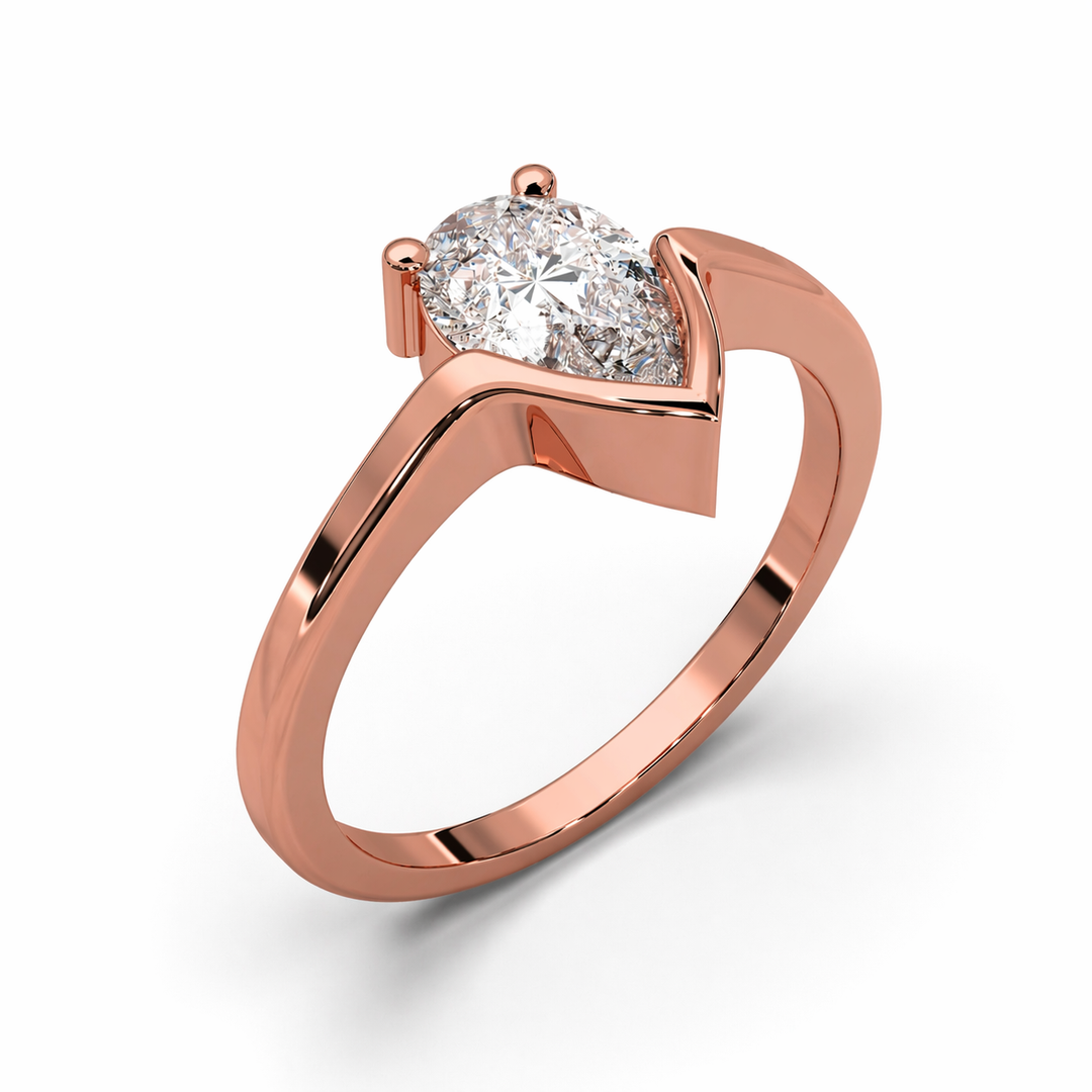 Lab-grown pear shape diamond ring in rose gold with half bezel and half prong setting