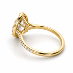 Load image into Gallery viewer, Side view of a natural pear halo diamond ring in 14K yellow gold with a pavé diamond band.