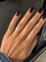Load image into Gallery viewer,     Marquise solitaire natural diamond engagement ring on hand in yellow gold