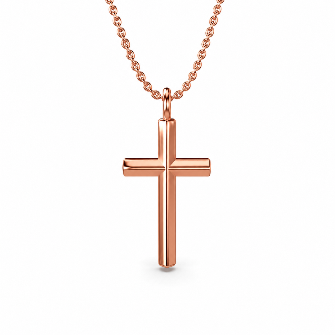 Rose gold cross necklace on a chain
