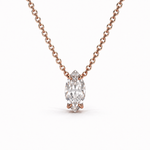 Load image into Gallery viewer, Marquise lab-grown diamond solitaire pendant necklace in 14K rose gold with a delicate cable chain on a white background.