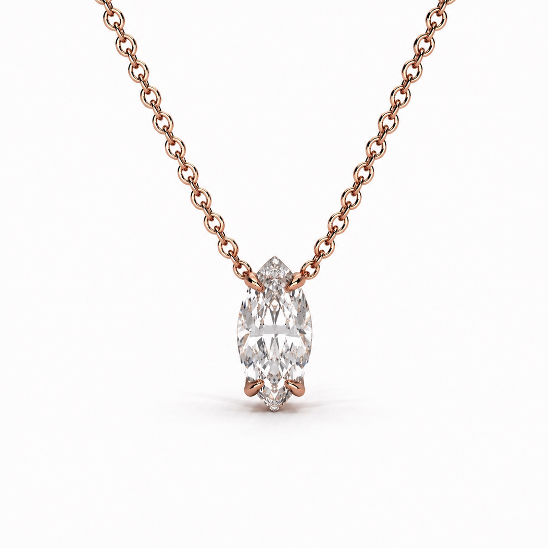Marquise lab-grown diamond solitaire pendant necklace in 14K rose gold with a delicate cable chain on a white background.