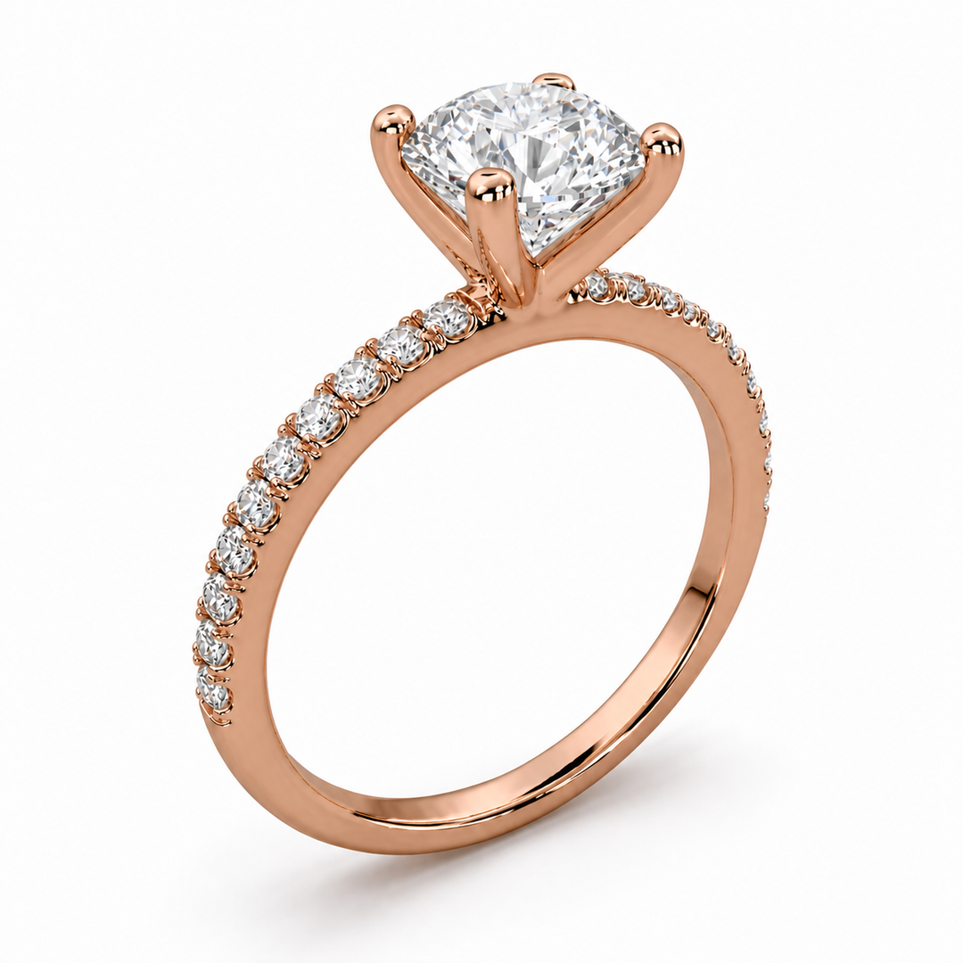     Side view of a round solitaire natural diamond ring with pavé side diamonds in rose gold.